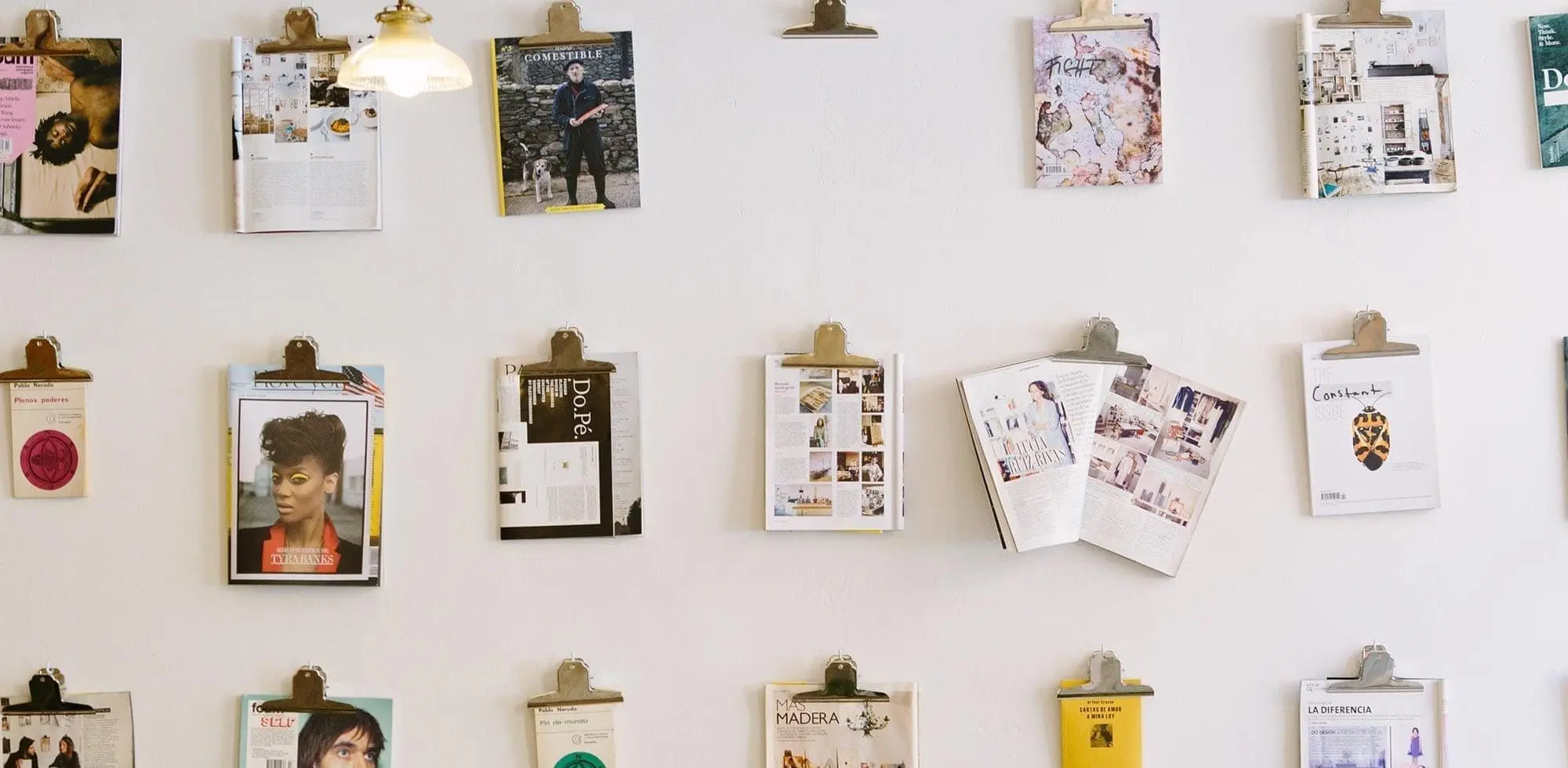 a wall full of clipboards