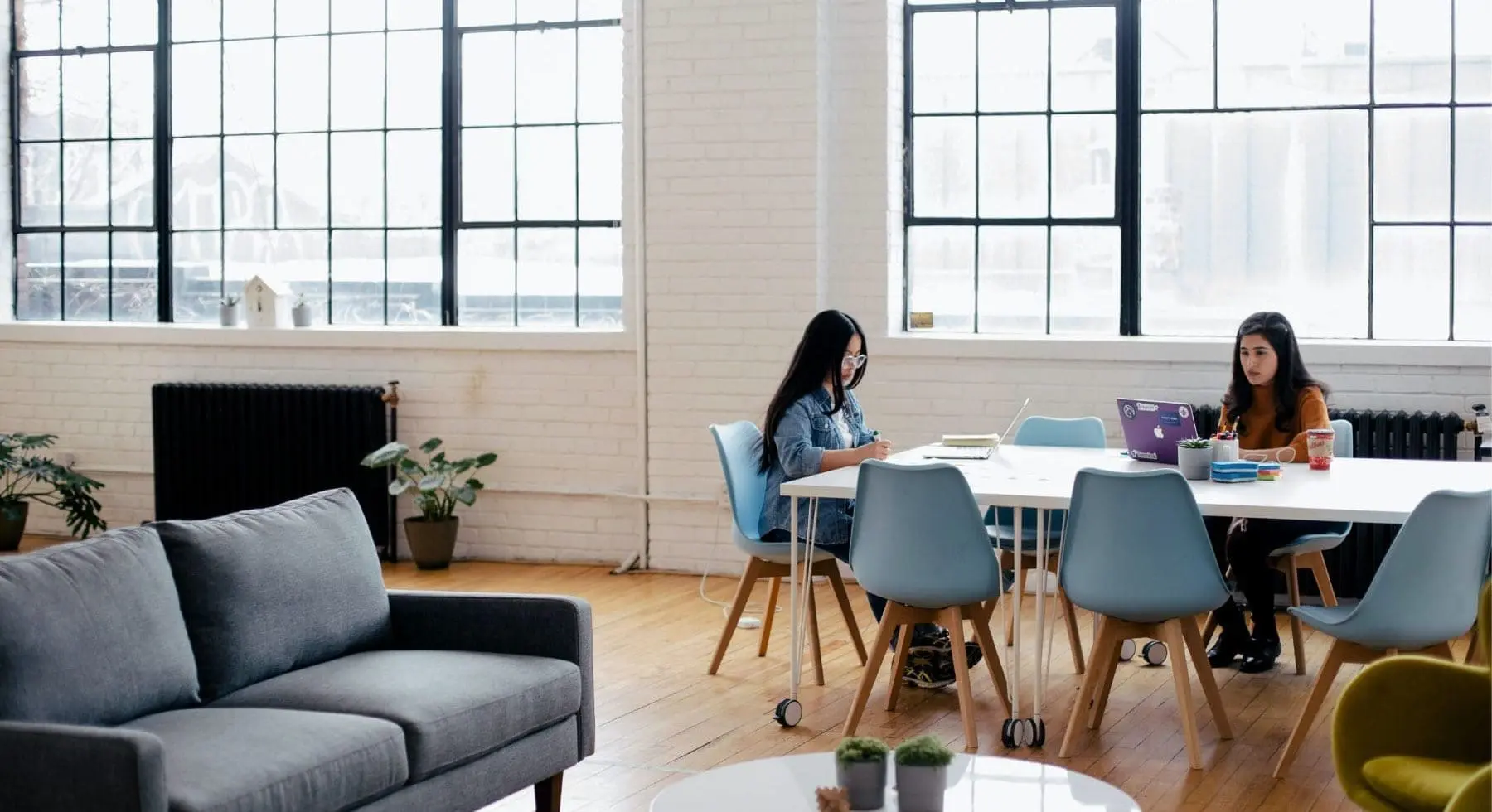 two woman working in an office