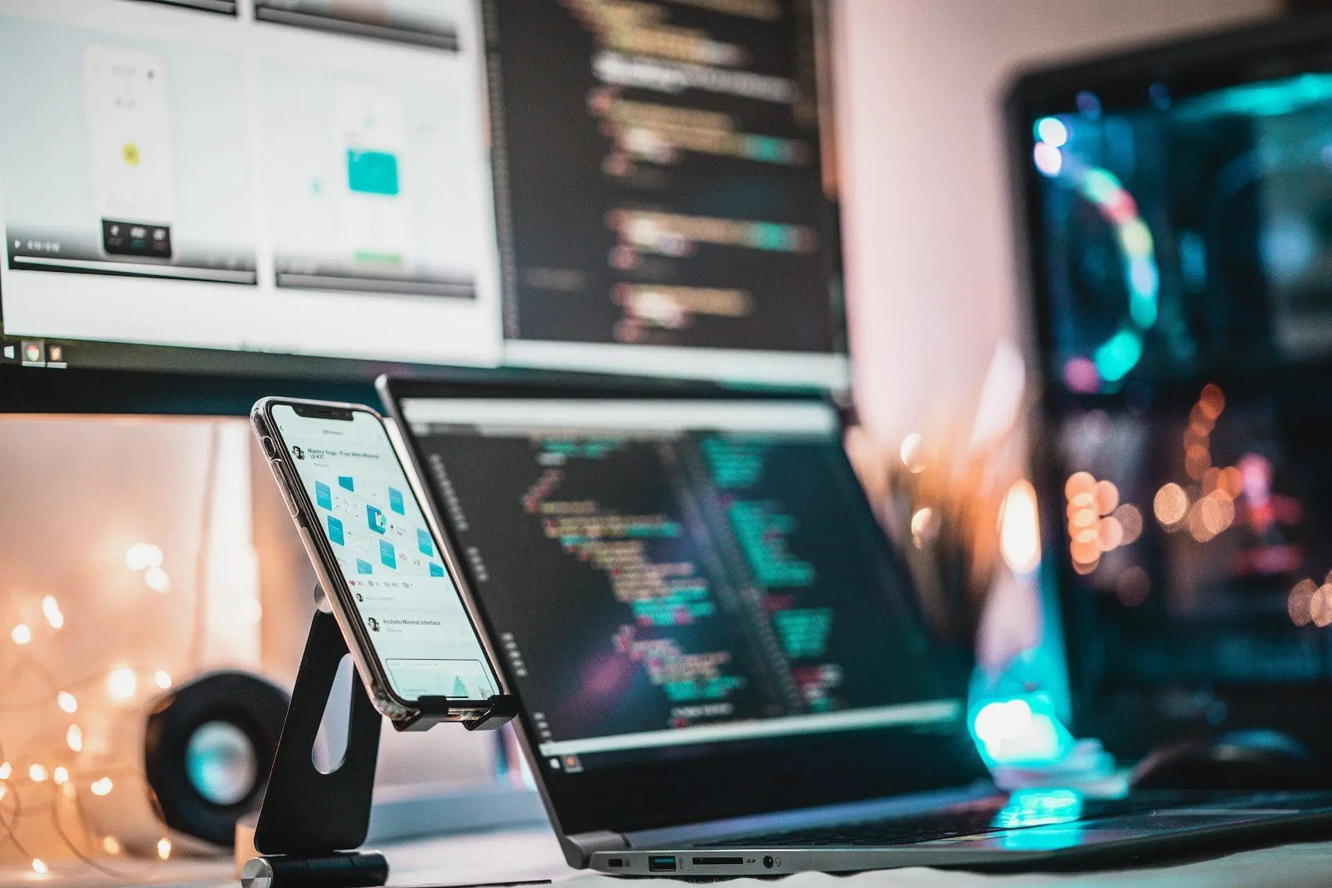a mobile, laptop, and desktop