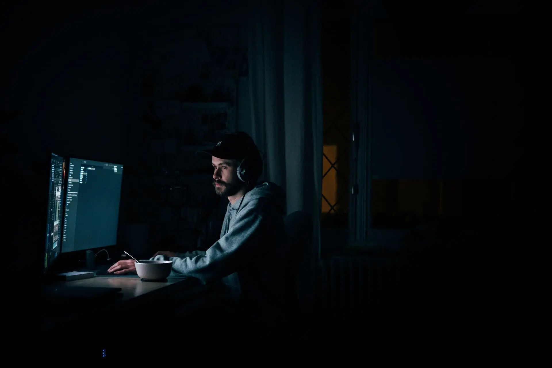a developer coding in dark room