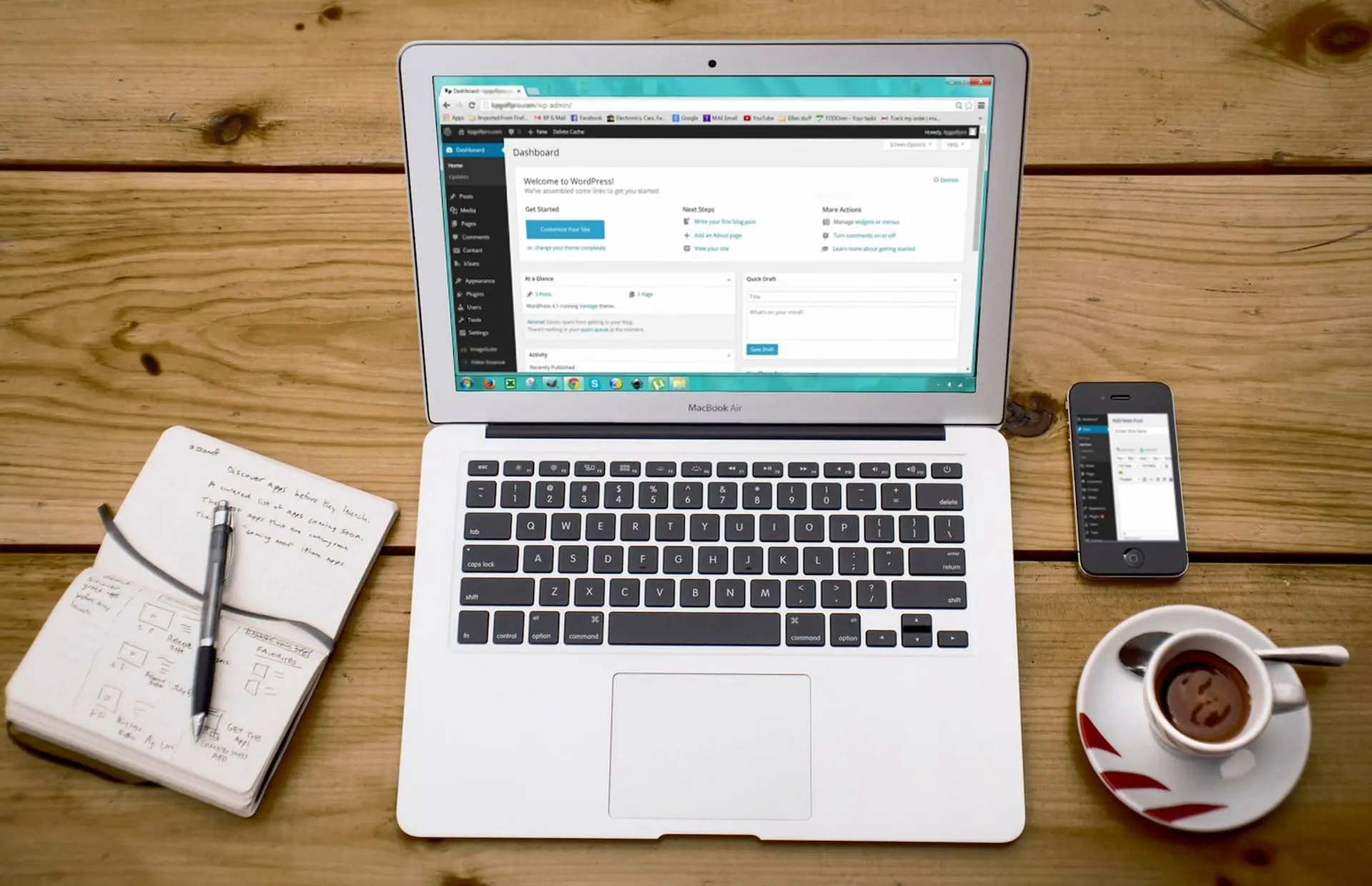 open laptop on wooden table