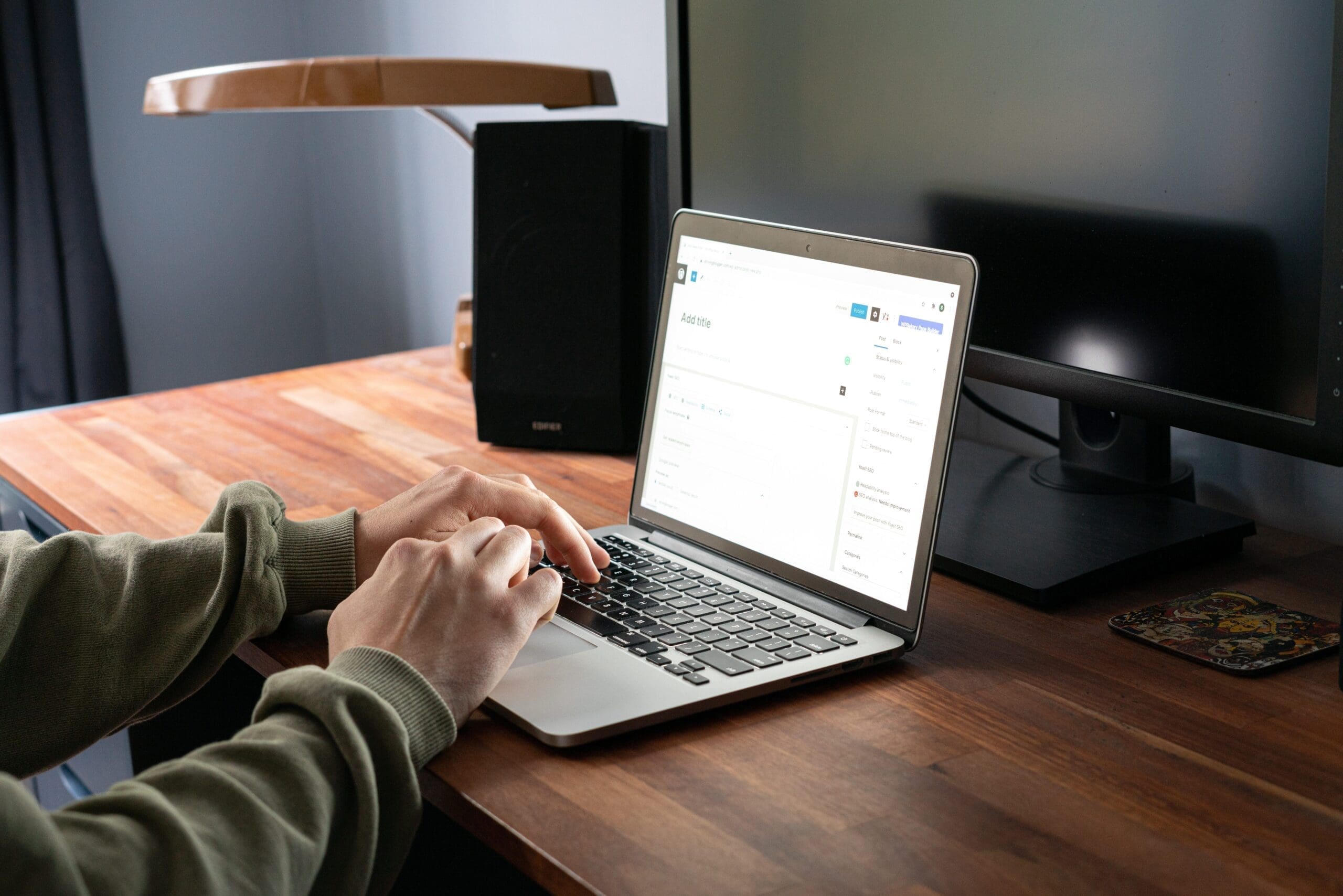 a person using a laptop on the table